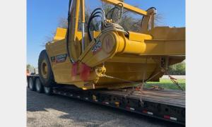 Large road-working equipment being hauled by Oden Transport, which covers the states of Texas, Oklahoma, Kansas & New Mexico.
